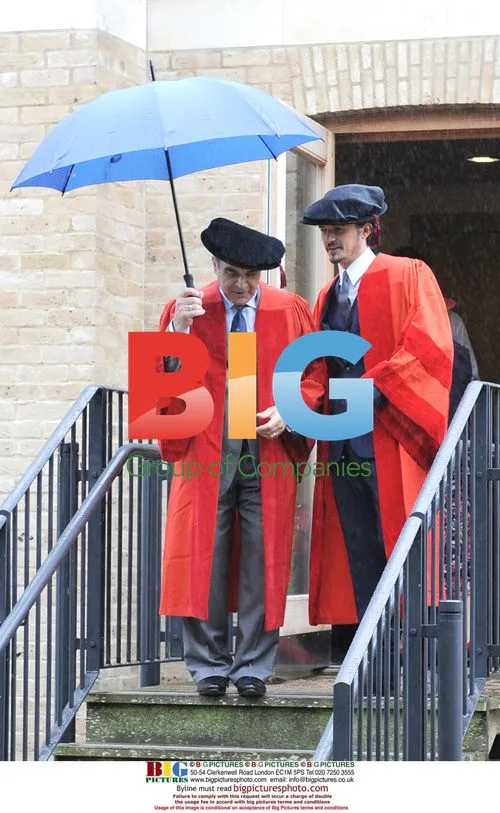 Orlando Bloom, Miranda Kerr, and David Suchet at university ceremony