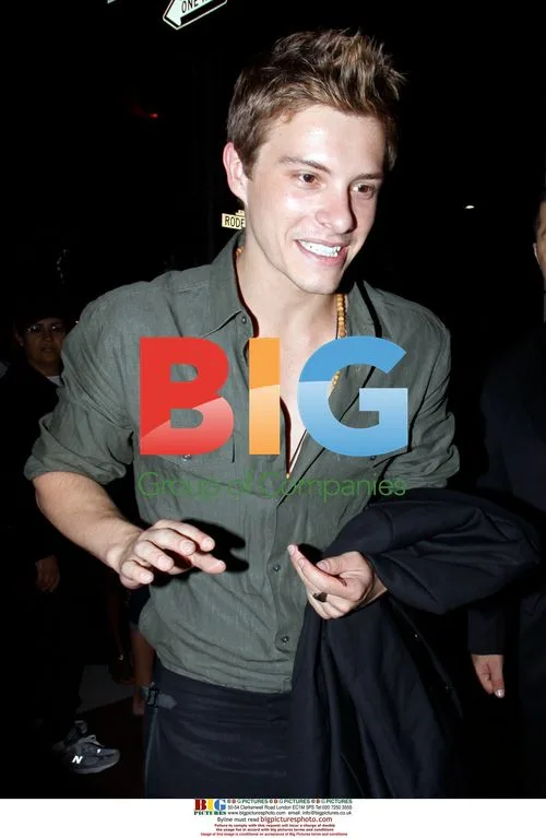 Xavier Samuel Leaves Louis Vuitton Party with Girlfriend