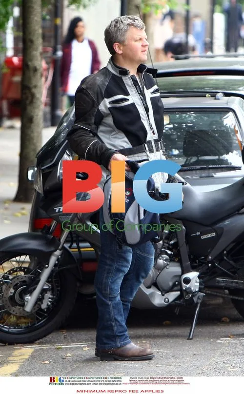 Adrian Chiles Rides Motorcycle Without Helmet