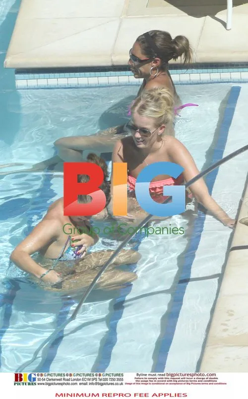 Rooney Relaxing at Poolside