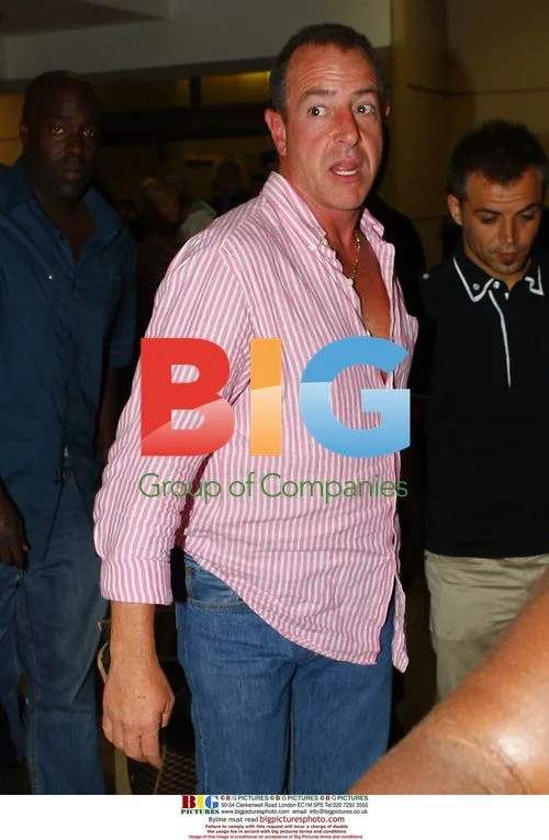 Michael Lohan Arrives at LAX Before Lindsay