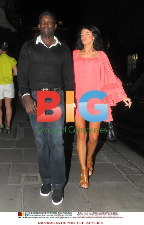 Dwight Yorke Leaves London Hotel With Mystery Woman