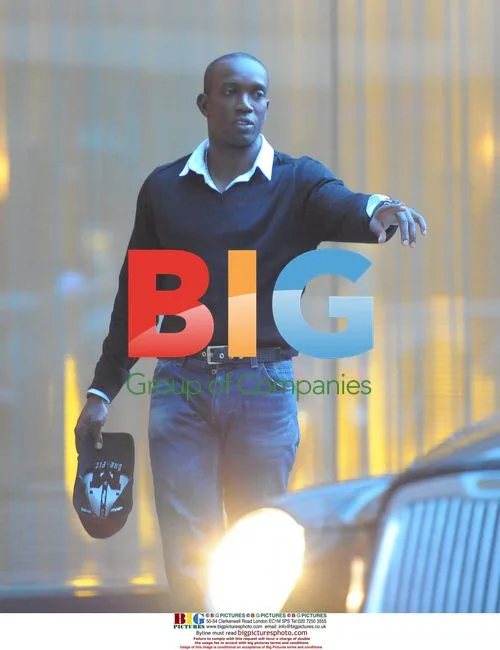Dwight Yorke with mystery woman