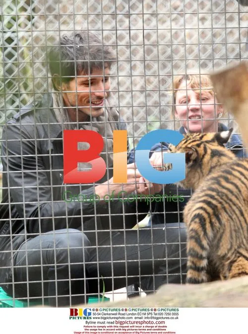 Kylie Minogue and boyfriend feed baby tigers