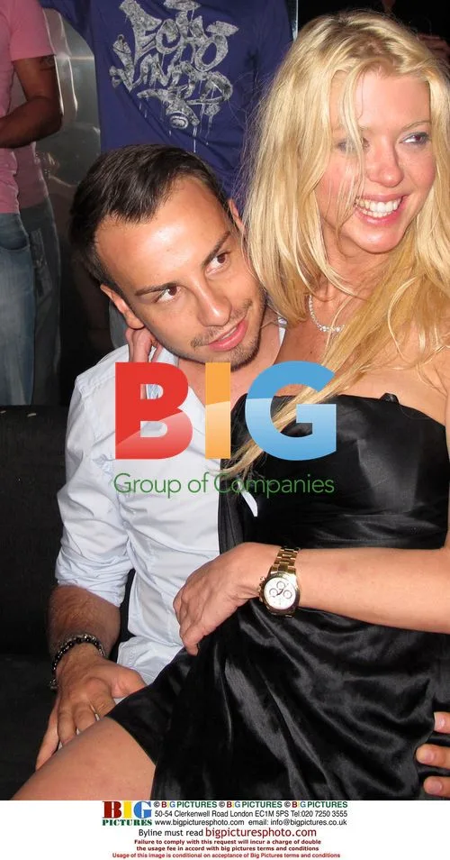 Tara Reid and Michael Axtmann at VIP Room in St. Tropez
