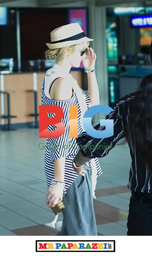Brian Mcfadden and Delta Goodrem at Bali airport