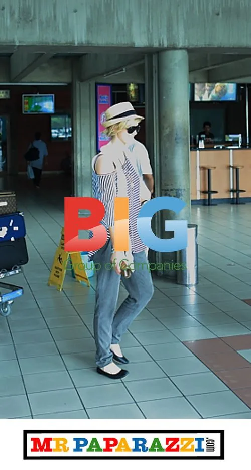 Brian Mcfadden and Delta Goodrem arrive at Bali airport