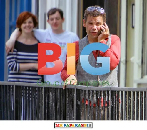 Craig Charles Talks on Phone Outside Pub