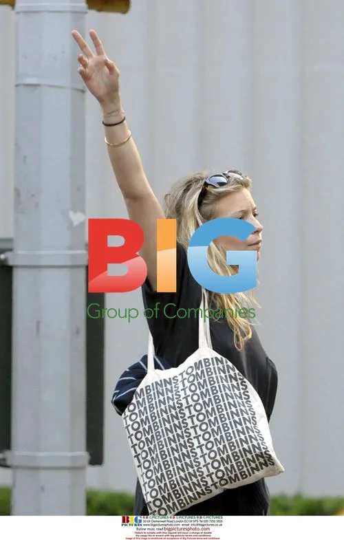Charlotte Ronson Hailing Cab in NYC
