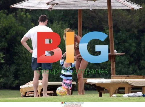 Claudine and Robbie Keane with son in Sardinia