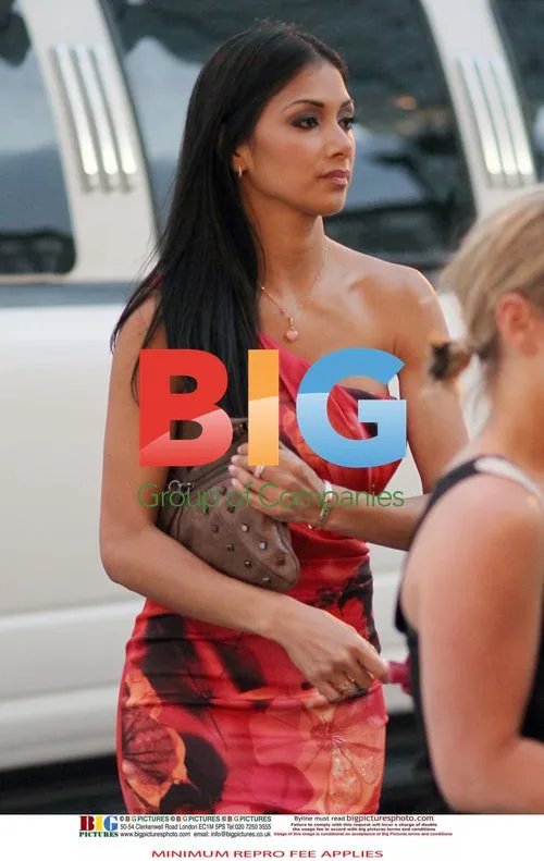 Nicole Scherzinger and Lewis Hamilton with Child