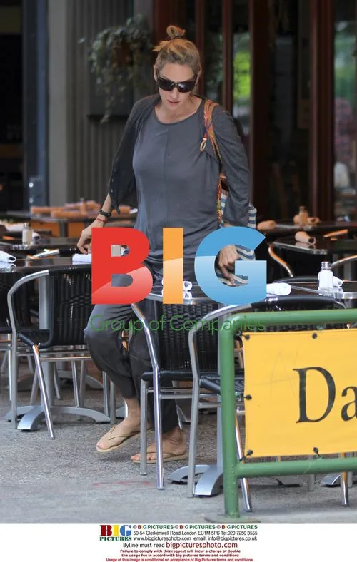 Uma Thurman Leaving Restaurant with Friend