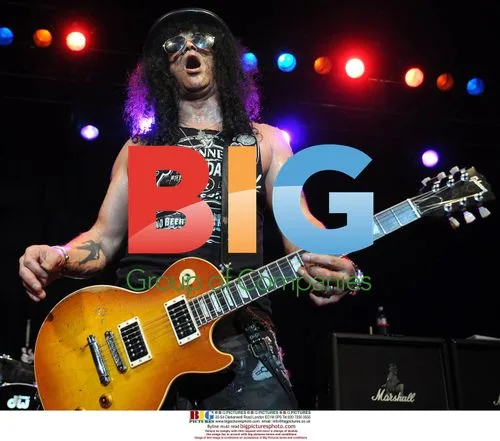 Slash Plays Dublin Gig in Guinness Tee