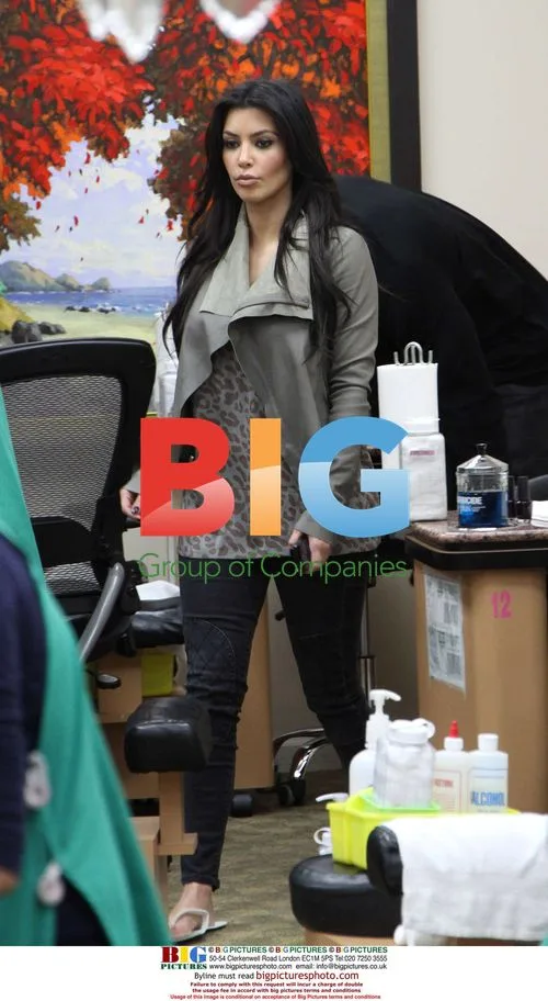 Kim Kardashian and Reggie Bush at Salon