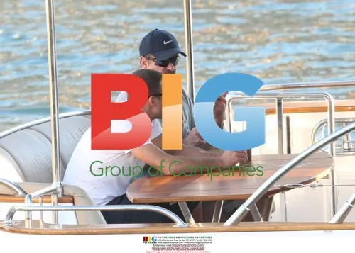 George Michael Enjoys Boat Cruise with Boyfriend