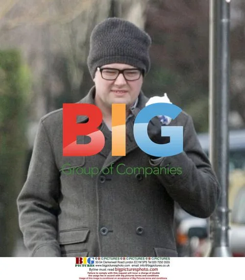 Alan Carr takes his dog for a walk