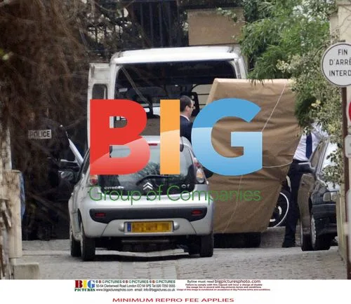 Carla Bruni Sarkozy Picking Up Son