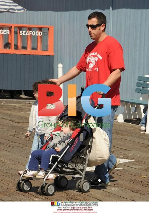 Adam Sandler with children at Make-A-Wish event