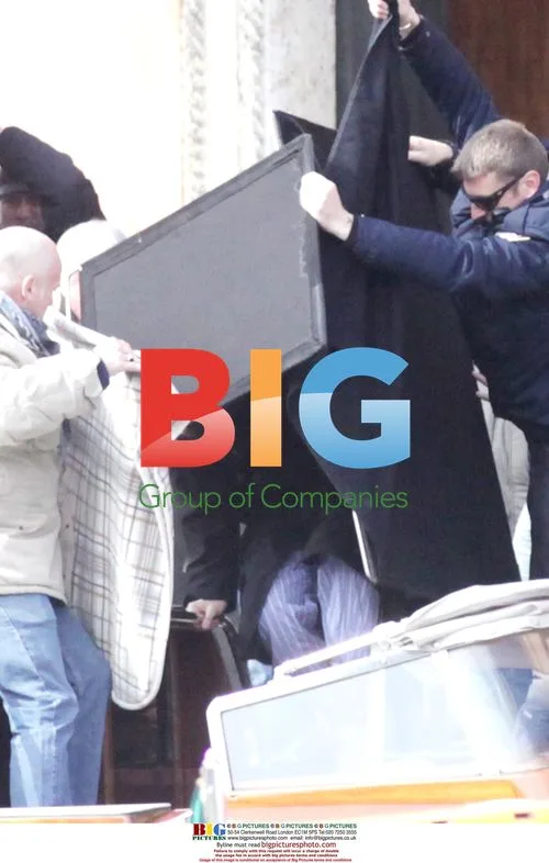 Johnny Depp Covered by Bodyguards on Film Set