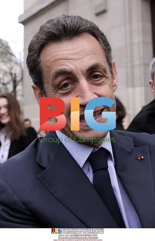Sarkozy and Bruni Vote in Paris