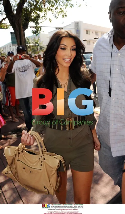 Kim and Kourtney Kardashian Arrive at Dash Store
