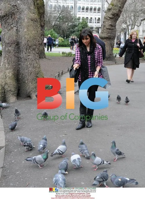 Roxanne Pallett Feeding Swans in Dublin