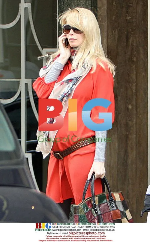 Claudia Schiffer Leaves London Hotel