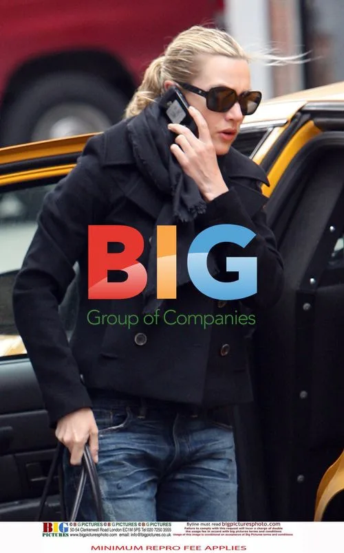 Kate Winslet Exits Taxi in NYC