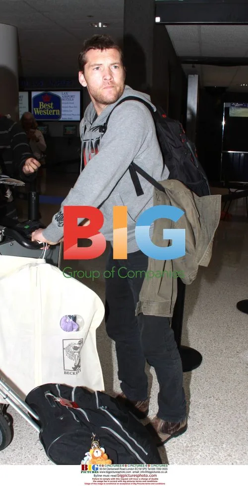 Sam Worthington Arrives at LAX