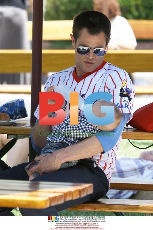 Johnny Knoxville feeding son Rocko in Malibu