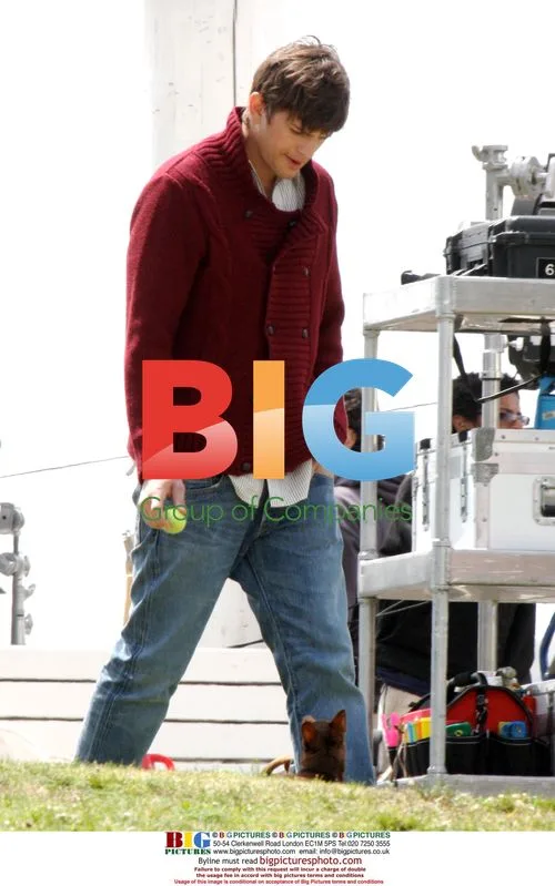 Ashton Kutcher Plays Ball with Dog on Set