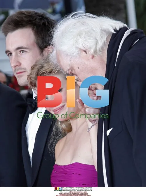 Melanie Thierry receives kiss at Cannes