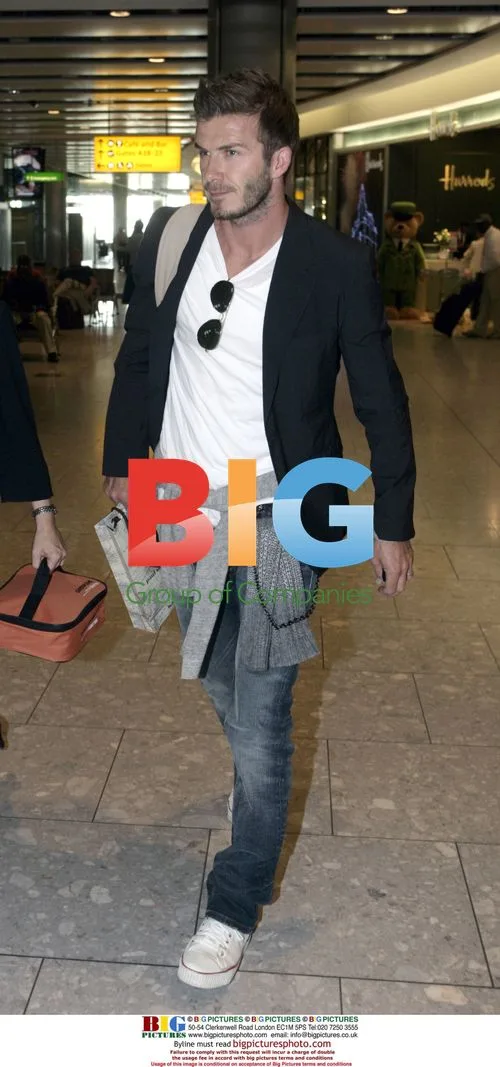 David Beckham departs Heathrow