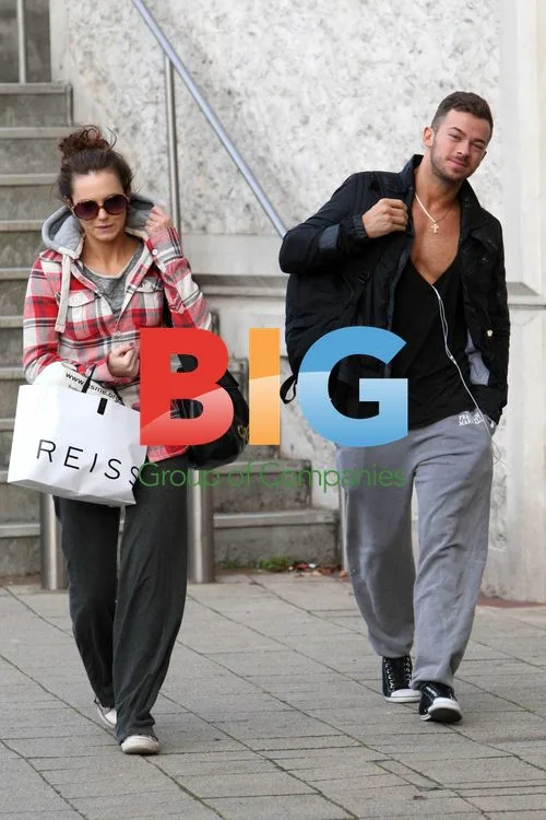 Kara Tointon and Artem Chigvintsev leave home