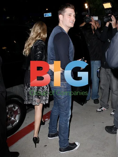Michael Bubl and fiancee leave BOA Steakhouse