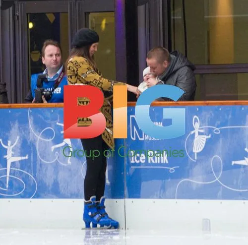Danielle Lloyd and Jamie O'Hara Ice Skating With Child