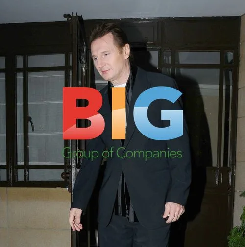 Liam Neeson leaving Dorchester Hotel