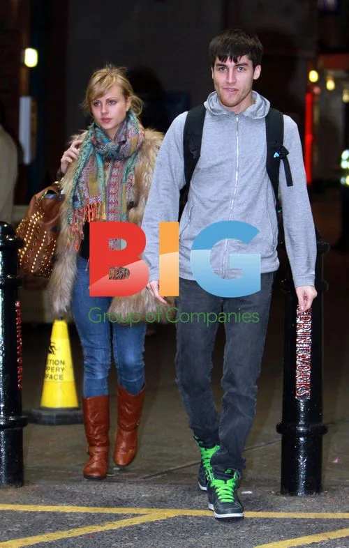 Tina O'Brien and Jared Murillo leaving Nandos