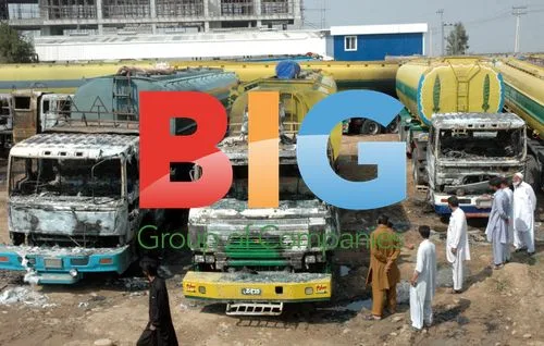 Burnt-out supply tankers after attack in Pakistan