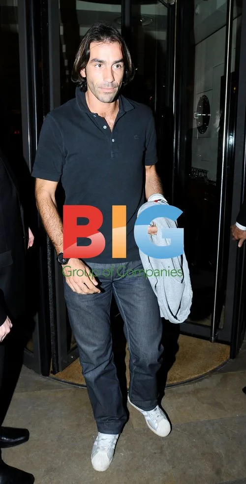 Ex Arsenal footballer Robert Pirs leaving London restaurant