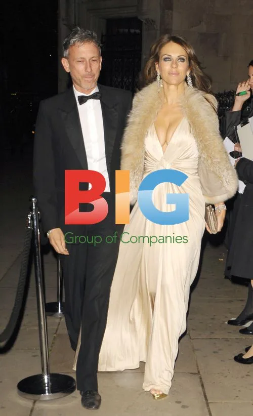 Patrick Cox and Elizabeth Hurley at Party