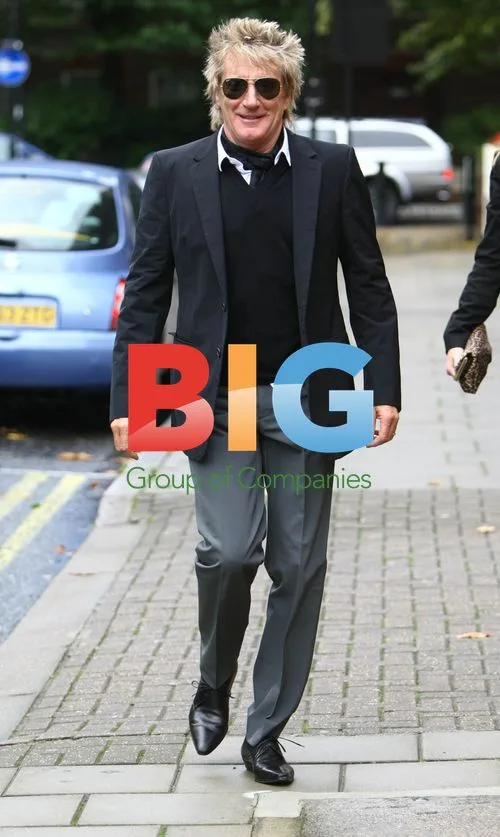 Rod Stewart Accompanies Penny Lancaster to Clinic