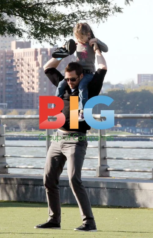 Hugh Jackman with kids at the park