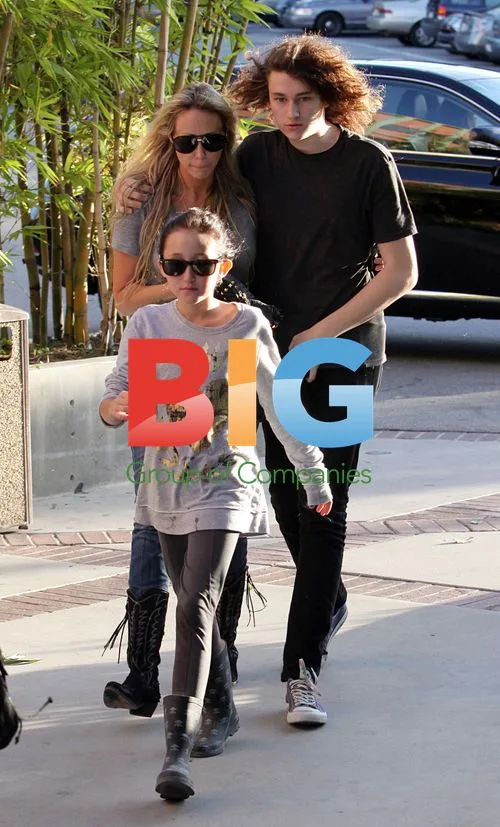 Tish Cyrus and kids arrive at lawyers office