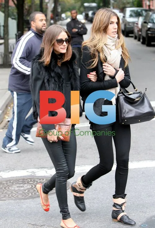 Olivia Palermo hails cab after lunch in NYC