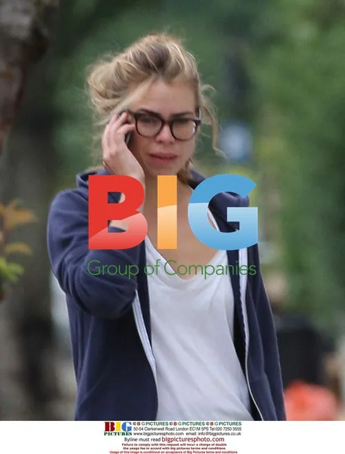 Billie Piper walks dog in London