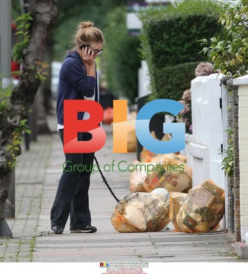 Billie Piper walking dog in London