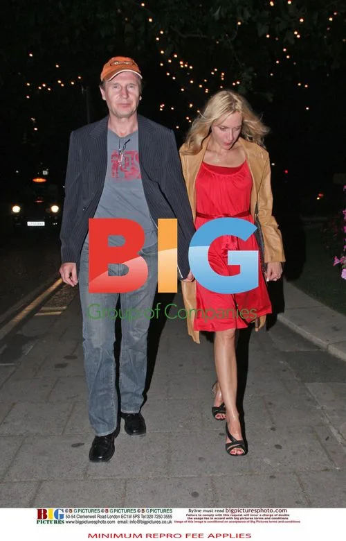 Liam Neeson spotted with mystery blonde