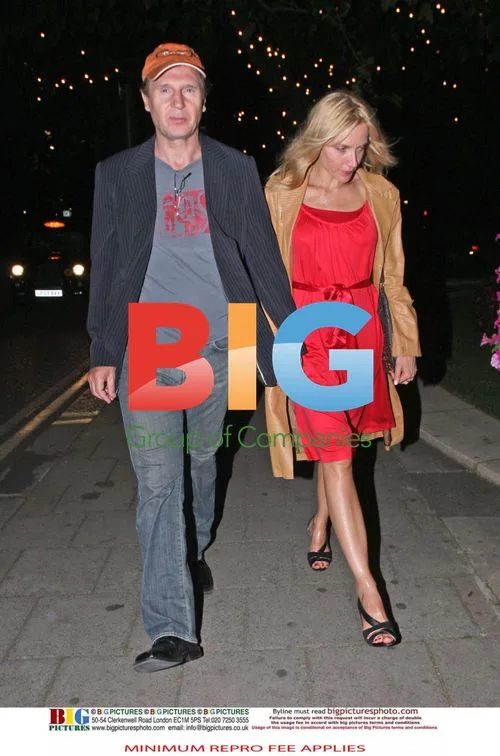 Liam Neeson spotted with mystery blonde
