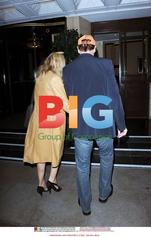 Liam Neeson With Mystery Blonde Woman